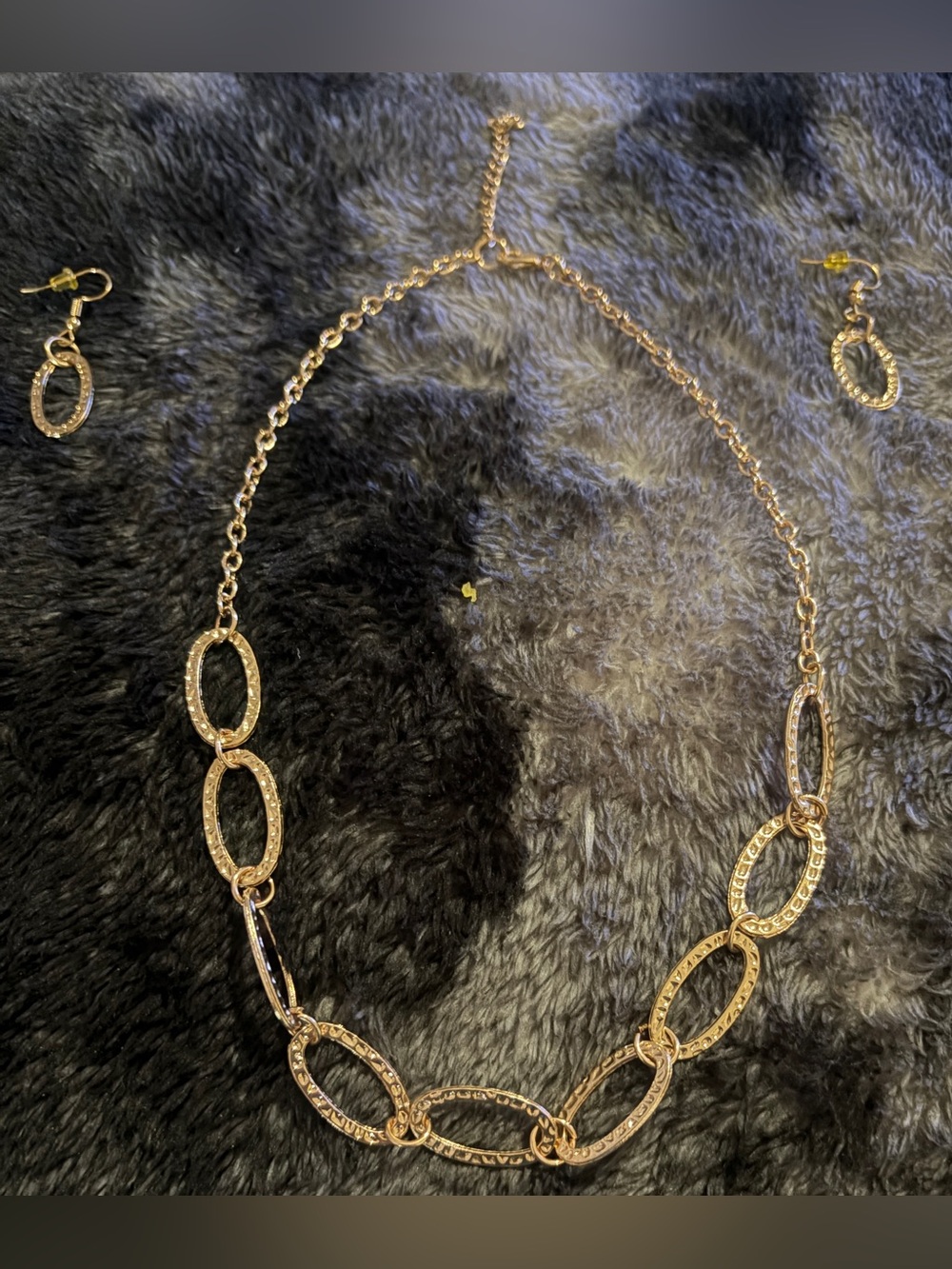 A set of Gold Linked Oval Necklace and earrings for Women